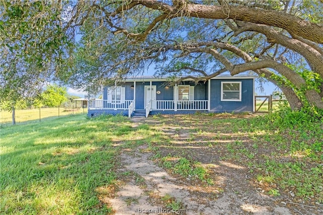 ranch-style house with covered porch