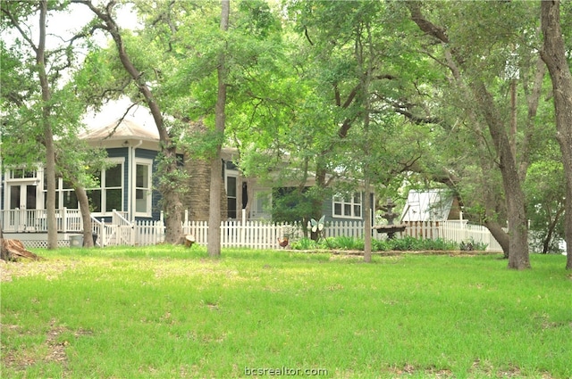 view of yard with a wooden deck