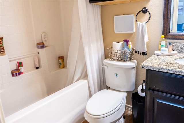 full bathroom featuring shower / bath combo, toilet, and vanity