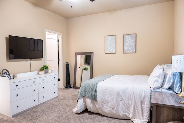 bedroom featuring ceiling fan and light carpet