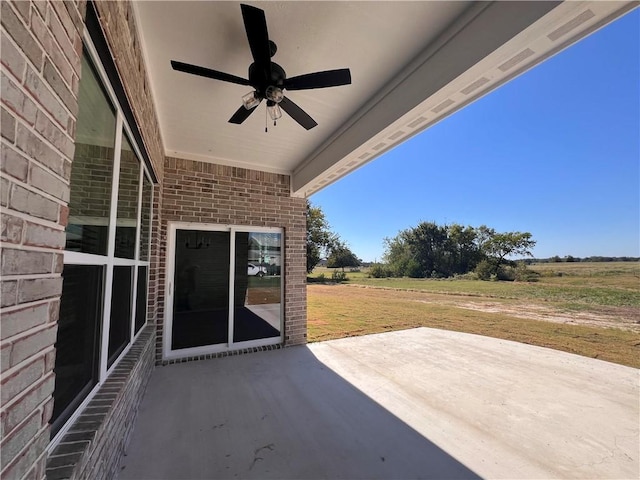 view of patio with ceiling fan