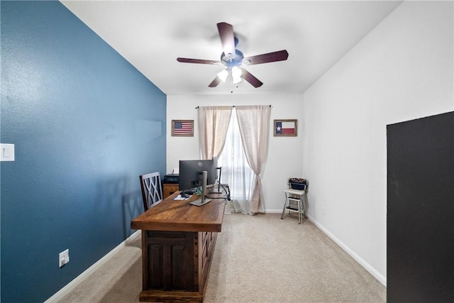 office area with ceiling fan and light colored carpet