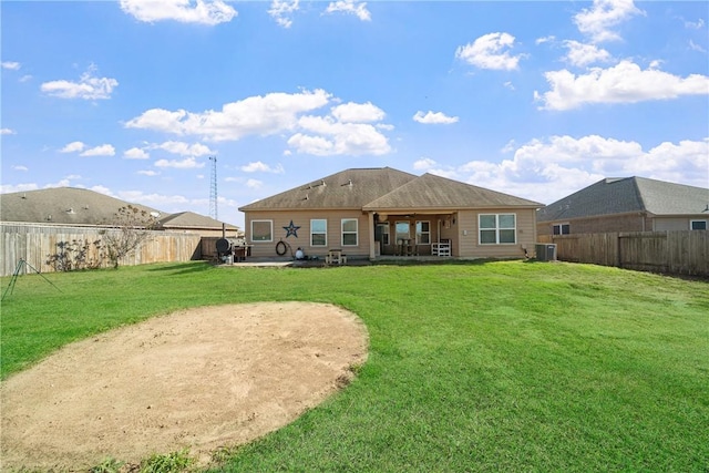 back of property featuring a patio, a yard, and central AC unit