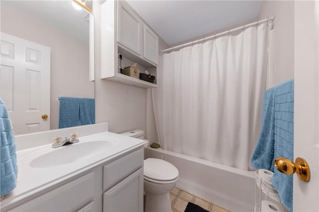 full bathroom with vanity, shower / bath combo, and toilet