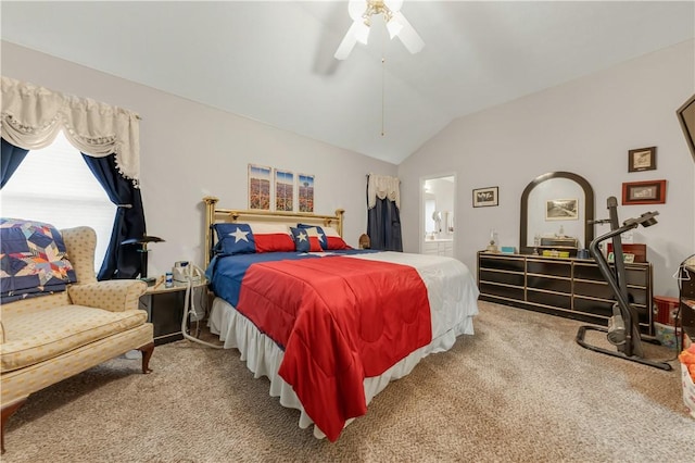 carpeted bedroom with lofted ceiling, ceiling fan, and ensuite bathroom