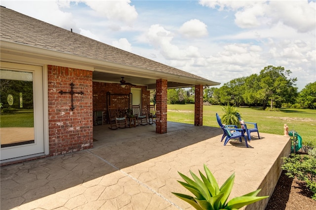 view of patio with a ceiling fan