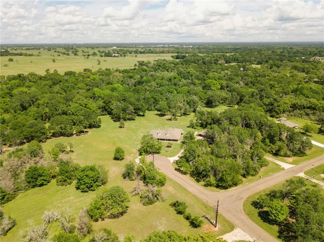 aerial view featuring a forest view