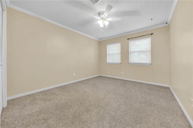 unfurnished room featuring crown molding, carpet, and ceiling fan