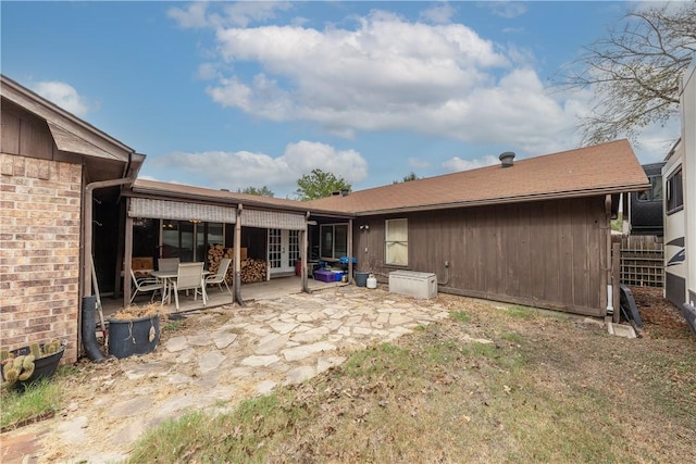 back of house featuring french doors and a patio area