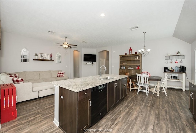 kitchen featuring dishwasher, dark hardwood / wood-style flooring, sink, and decorative light fixtures