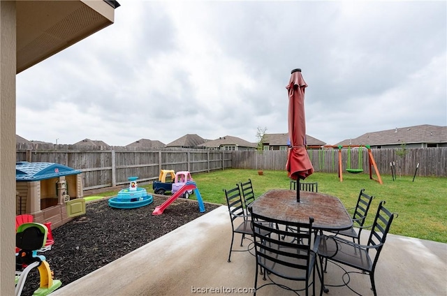 view of patio featuring a playground