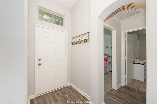 interior space with dark hardwood / wood-style floors