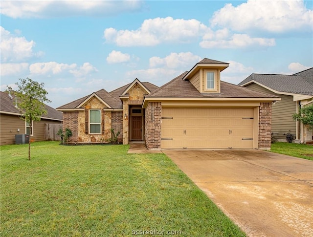 view of front of house featuring a front lawn, central AC unit, and a garage