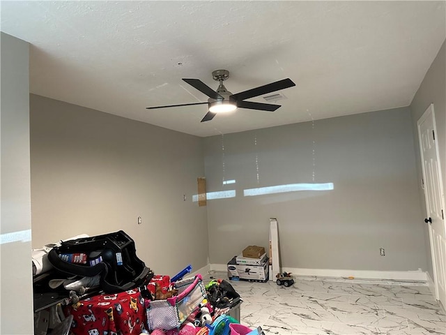 1906 Calvert Cir, Bryan, TX 77803 - unfurnished room with marble finish flooring and a ceiling fan