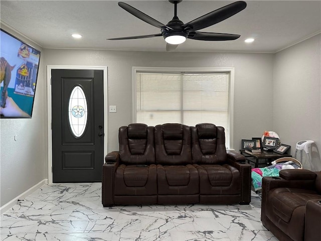 1906 Calvert Cir, Bryan, TX 77803 - living area featuring light marble finish flooring, ornamental molding, ceiling fan, and recessed lighting