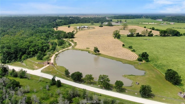 drone / aerial view featuring a rural view and a water view