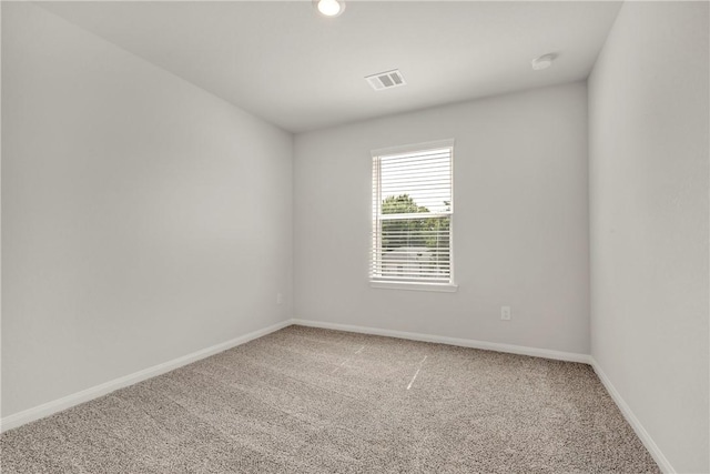 empty room with carpet floors