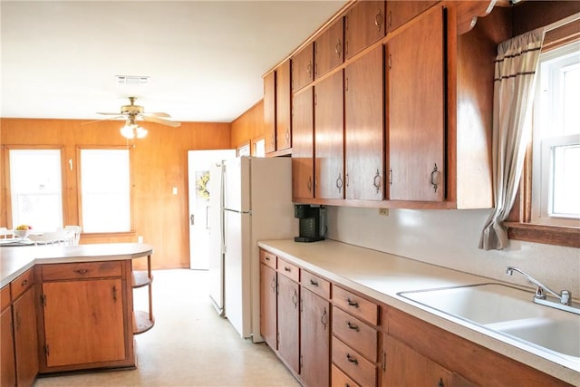 400 N Brazos St, Burton, TX 77835 - kitchen with light countertops, a healthy amount of sunlight, and a sink
