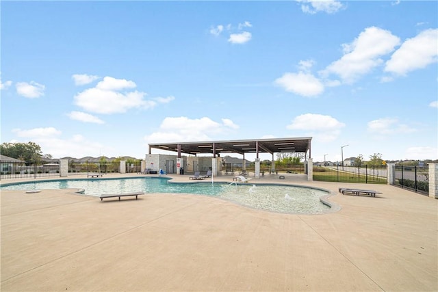 view of swimming pool featuring a patio area