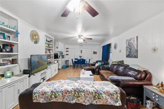 living area featuring ceiling fan and light wood-style floors
