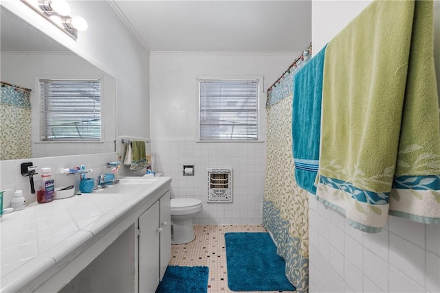 bathroom with toilet, tile patterned floors, tile walls, and heating unit
