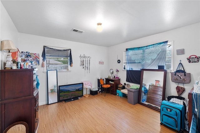 interior space with visible vents and light wood-style floors