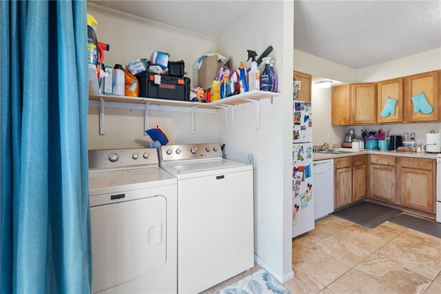 laundry area featuring laundry area and independent washer and dryer