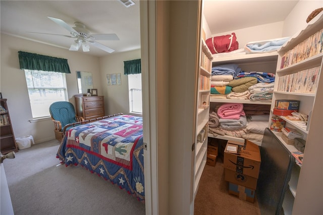 4988 Paso Fino Ln, Madisonville, TX 77864 - bedroom with carpet and ceiling fan