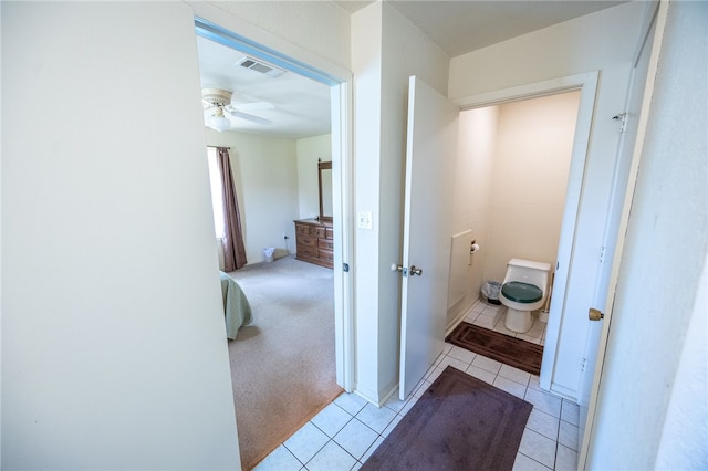 4988 Paso Fino Ln, Madisonville, TX 77864 - corridor with light tile patterned floors