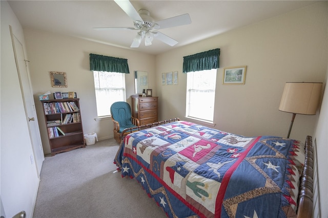 4988 Paso Fino Ln, Madisonville, TX 77864 - bedroom with carpet and ceiling fan