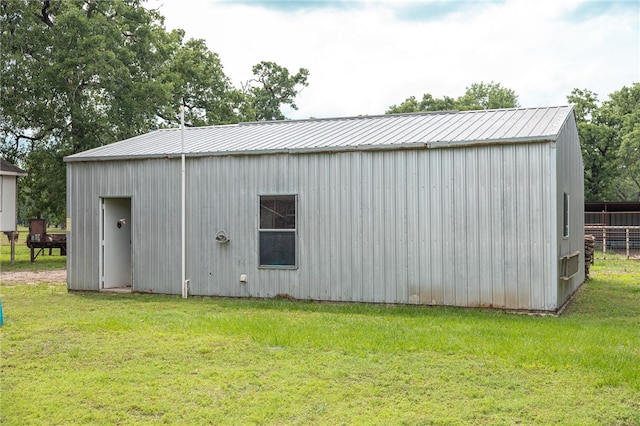 4988 Paso Fino Ln, Madisonville, TX 77864 - view of pole building featuring a yard