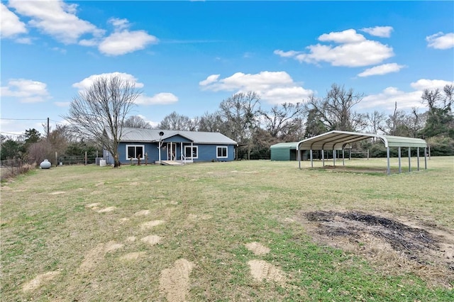 view of yard featuring a carport