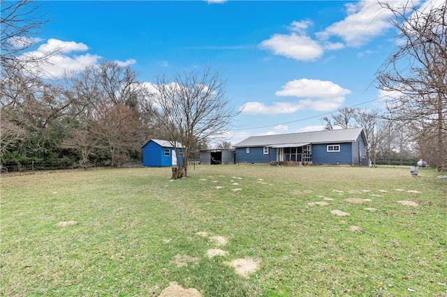 view of yard with a storage shed