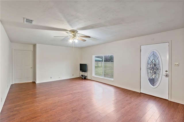 entrance foyer featuring ceiling fan and dark hardwood / wood-style flooring