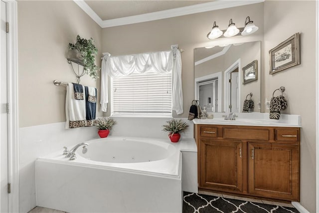 bathroom featuring ornamental molding, a washtub, and vanity