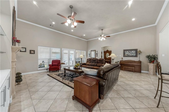 living room featuring french doors, ceiling fan, ornamental molding, and light tile patterned floors