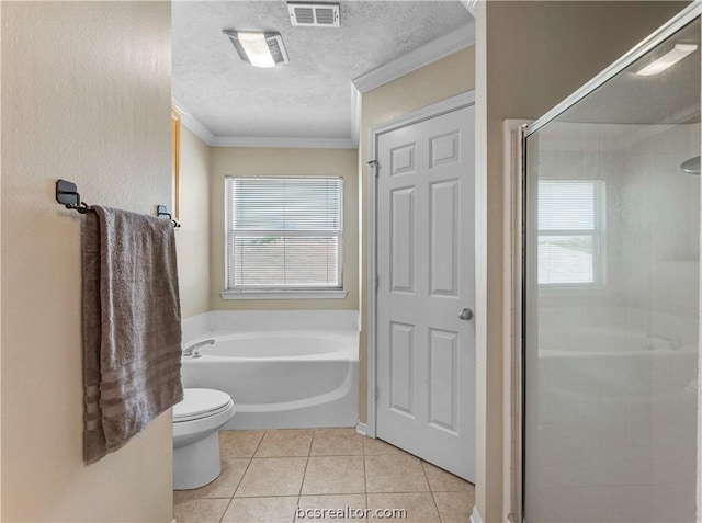 bathroom featuring ornamental molding, a textured ceiling, plus walk in shower, tile patterned flooring, and toilet