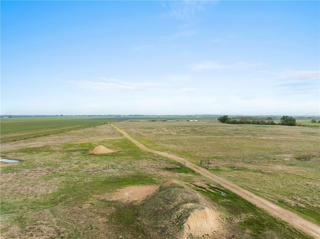 birds eye view of property featuring a rural view