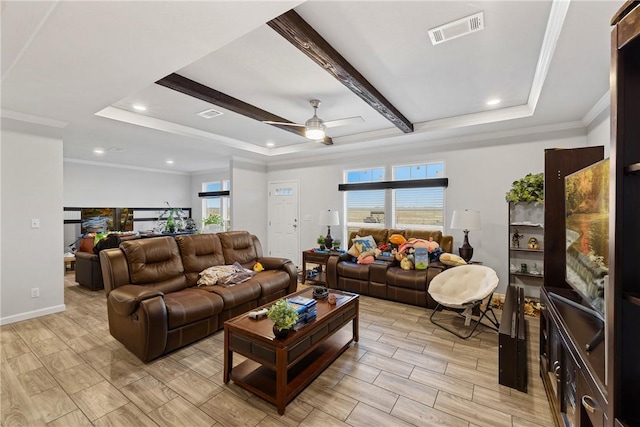 living area with ornamental molding, a tray ceiling, visible vents, and wood tiled floor