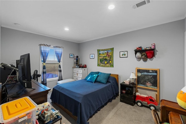 carpeted bedroom with visible vents and recessed lighting