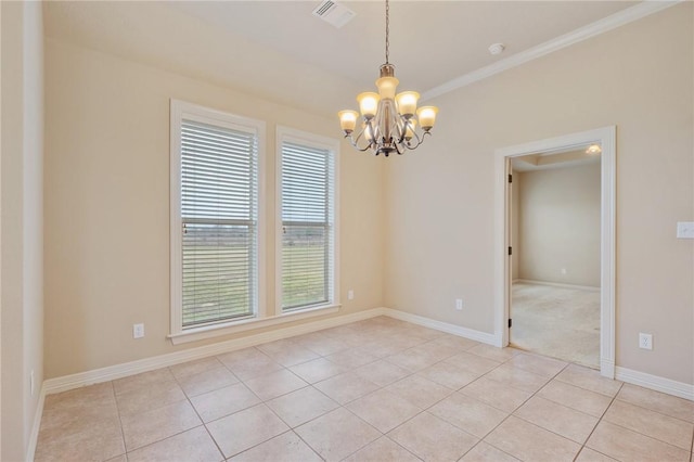 empty room featuring a chandelier, light tile patterned floors, and ornamental molding