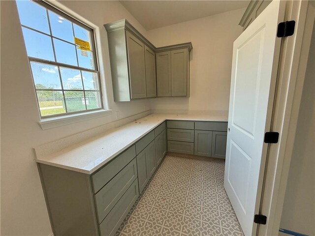 10070 Crown Pt, Iola, TX 77861 - unfurnished room with concrete flooring, baseboards, and a ceiling fan