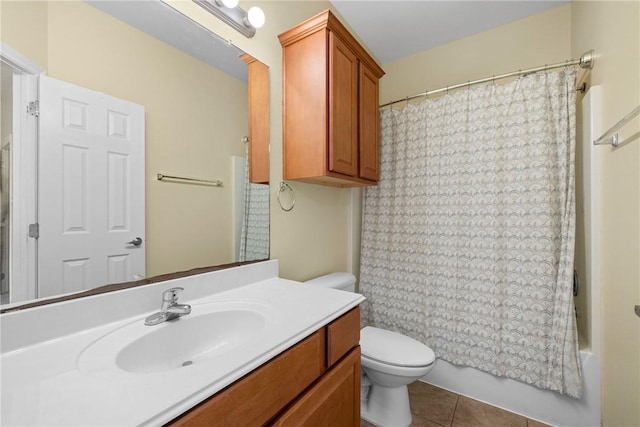 bathroom with shower / bath combo with shower curtain, vanity, tile patterned flooring, and toilet