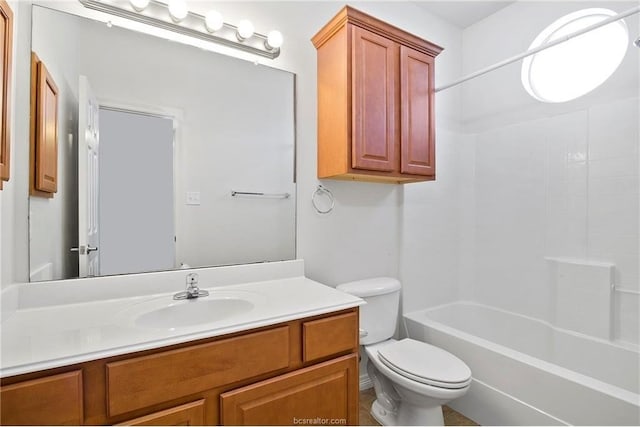 full bathroom featuring bathtub / shower combination, vanity, and toilet