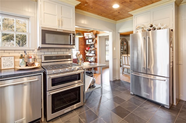 kitchen with ornamental molding, tasteful backsplash, dark countertops, stainless steel appliances, and wooden ceiling