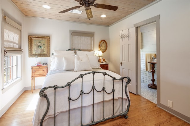 bedroom featuring wooden ceiling, light wood-style floors, and visible vents