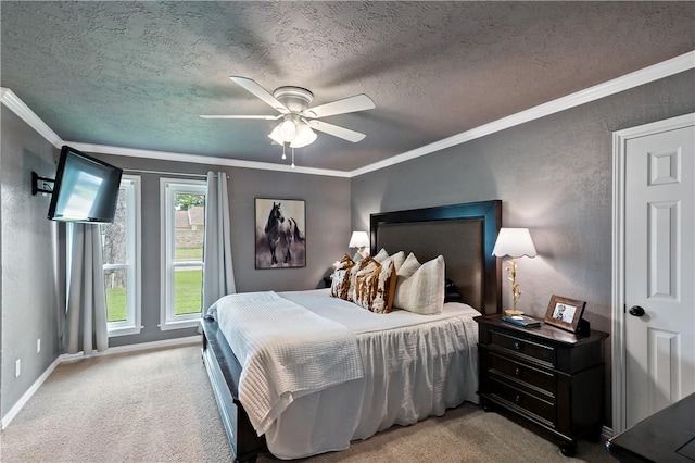 bedroom featuring baseboards, ornamental molding, a textured ceiling, and carpet floors