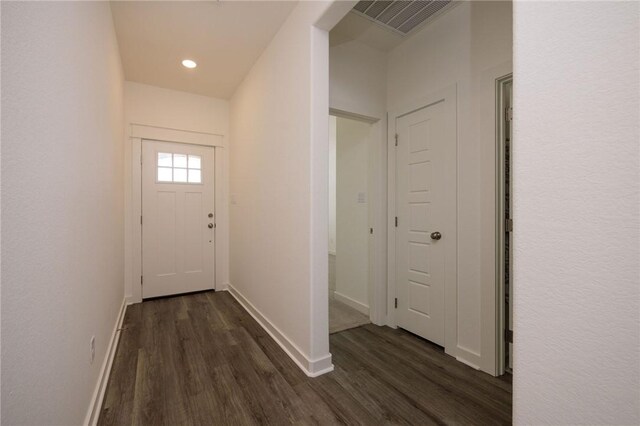 entrance foyer featuring dark hardwood / wood-style flooring