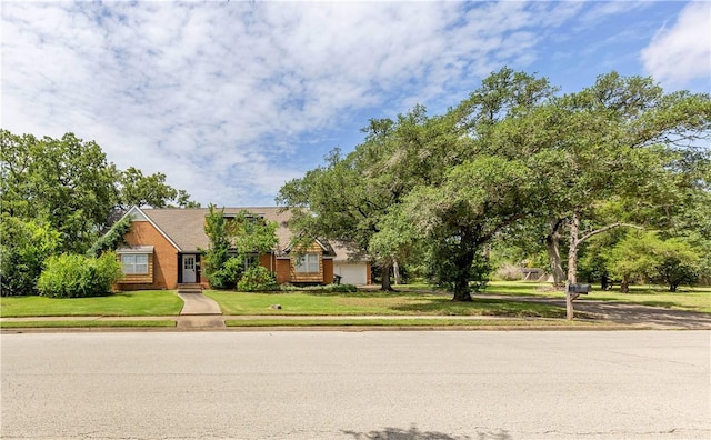 1502 Glade St, College Station, TX 77840 - view of front of house with a front yard