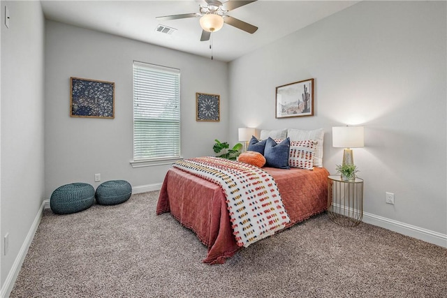 9868 Albert Dr, Iola, TX 77861 - bedroom with carpet floors and a ceiling fan